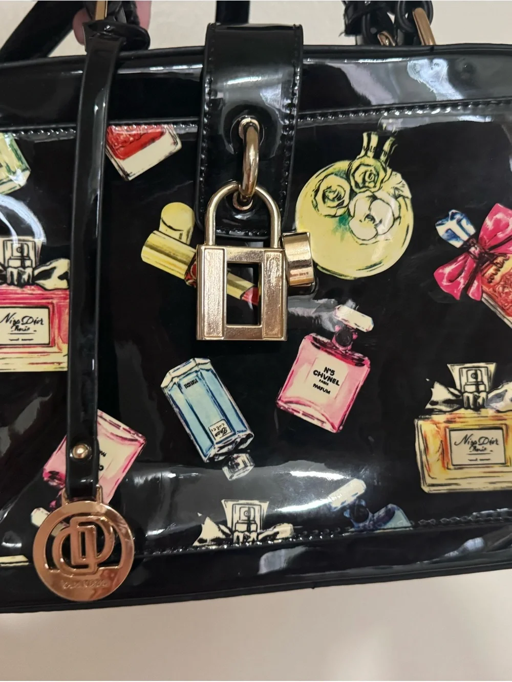 Black Patent Crossbody Bag with Perfume Bottle Print